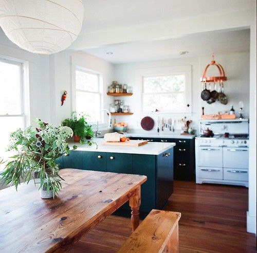 Open plan kitchen dinner, wooden farm house table