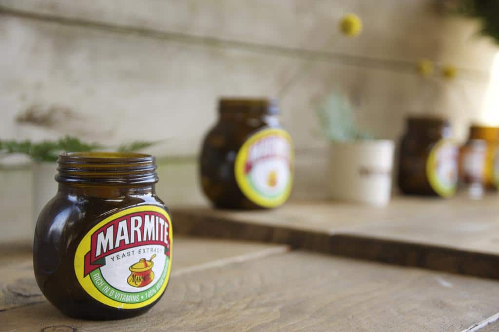 Marmite jars as flower vases at wedding